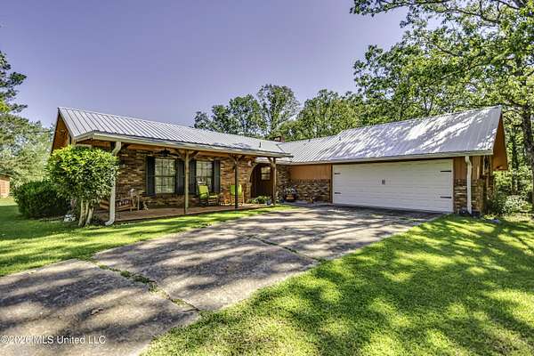 6.6 Acres of Land with Home for Sale in Brandon, Mississippi