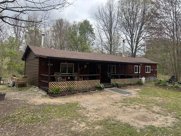 6.85 Acres of Land with Home for Sale in Grand Junction, Michigan