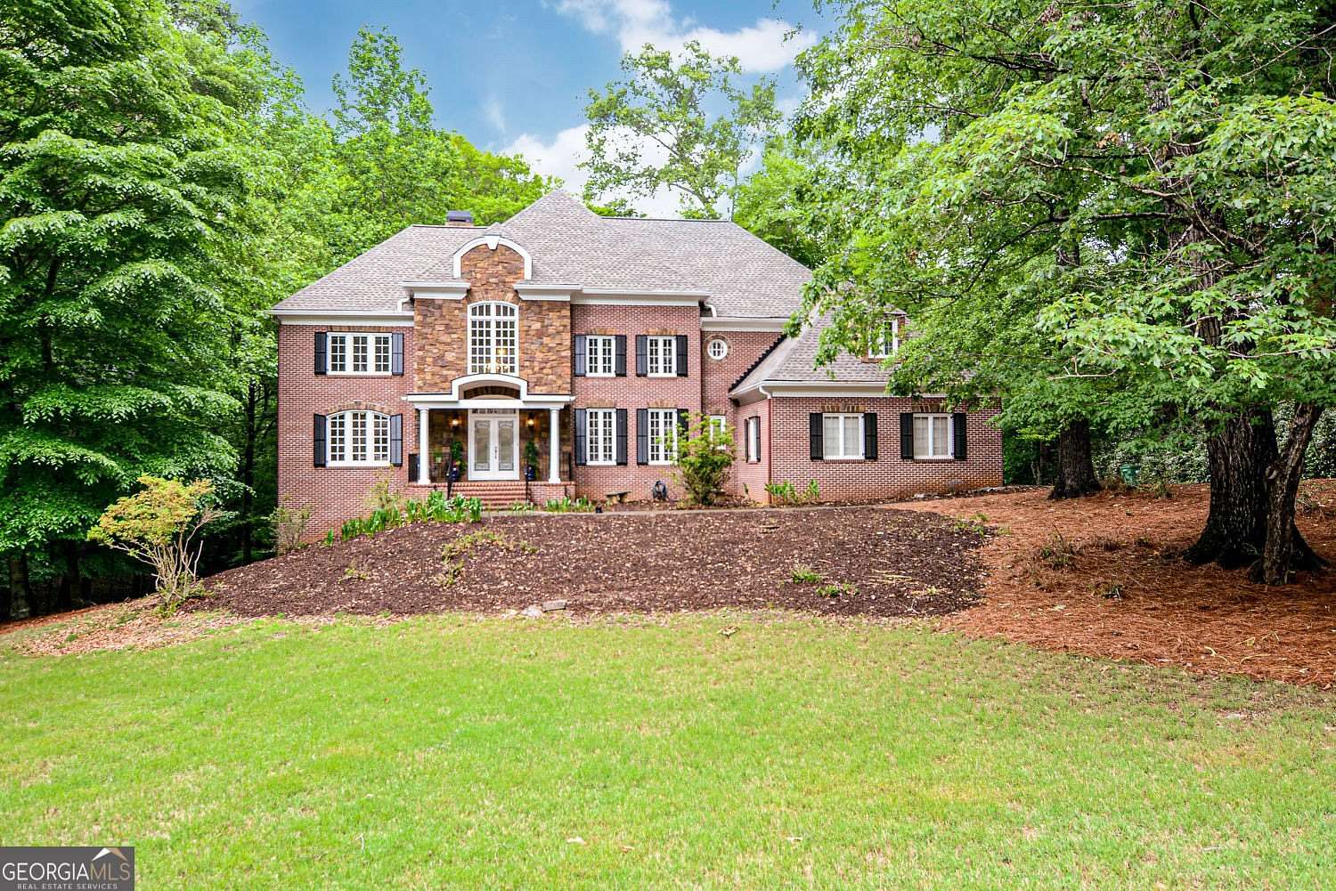 2.75 Acres of Land with Home for Sale in Peachtree Corners, Georgia
