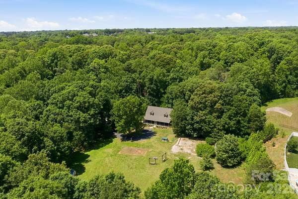 11.2 Acres of Land with Home for Sale in Mooresville, North Carolina