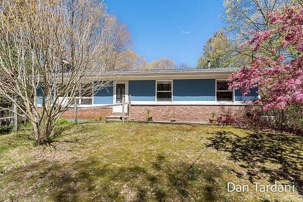 3 Acres of Land with Home for Sale in Spring Lake, Michigan