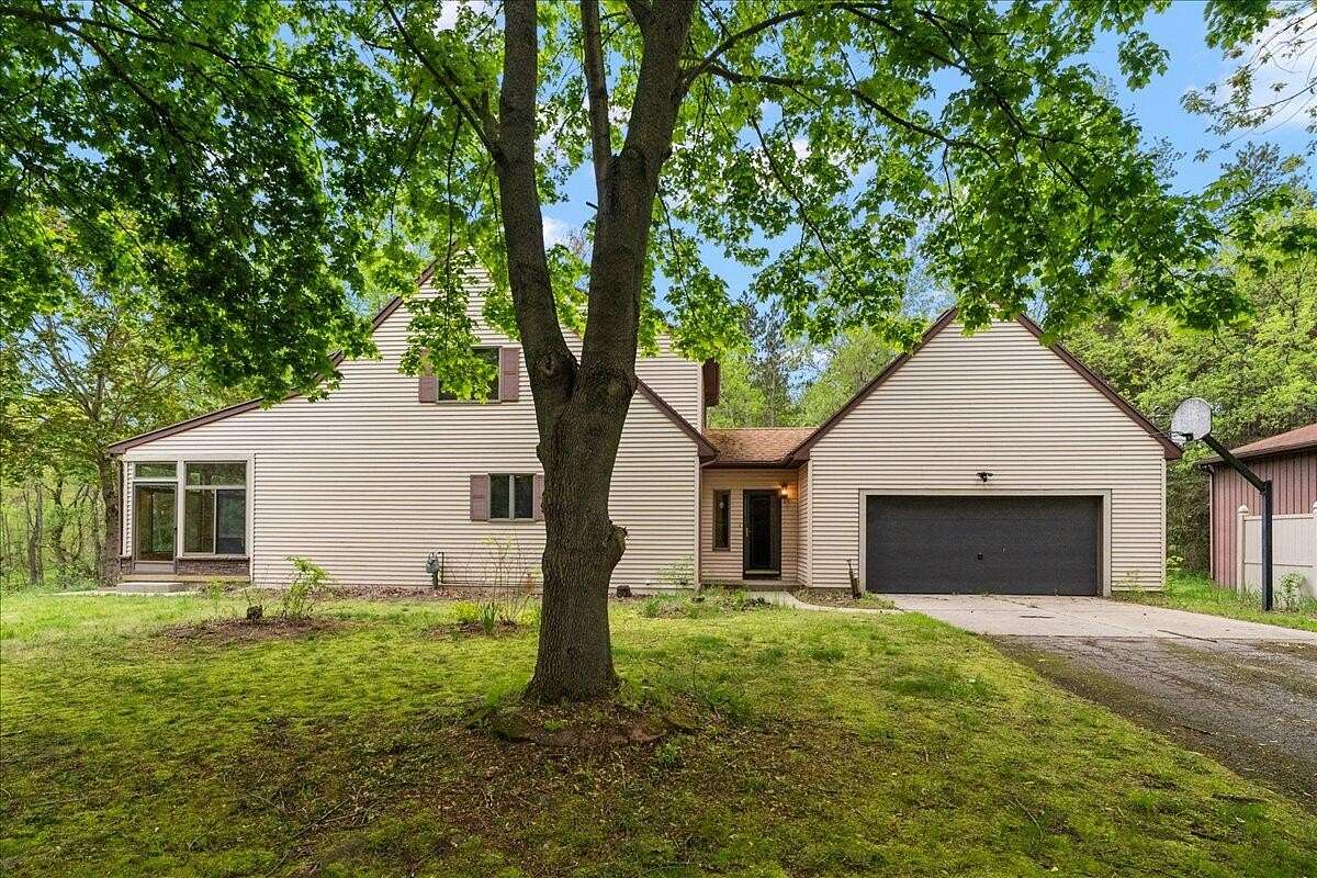 3.15 Acres of Land with Home for Sale in Rockford, Michigan