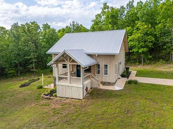 8.78 Acres of Land with Home for Sale in Harrison, Arkansas