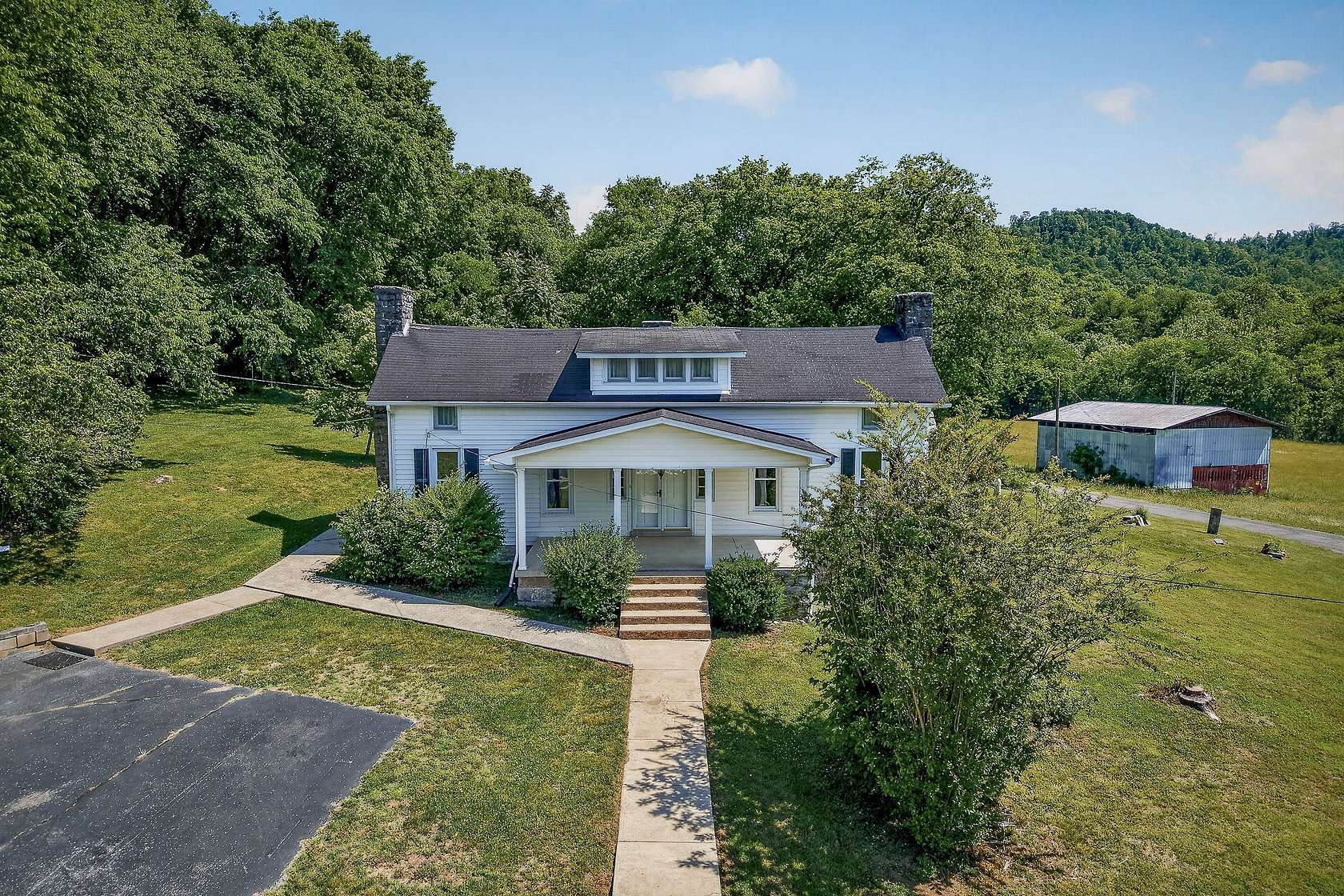 29.9 Acres of Recreational Land with Home for Sale in Pleasant Shade, Tennessee