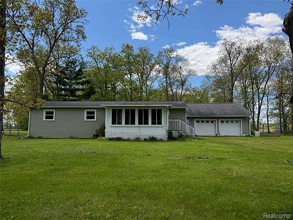 5 Acres of Land with Home for Sale in Ridgeway Township, Michigan