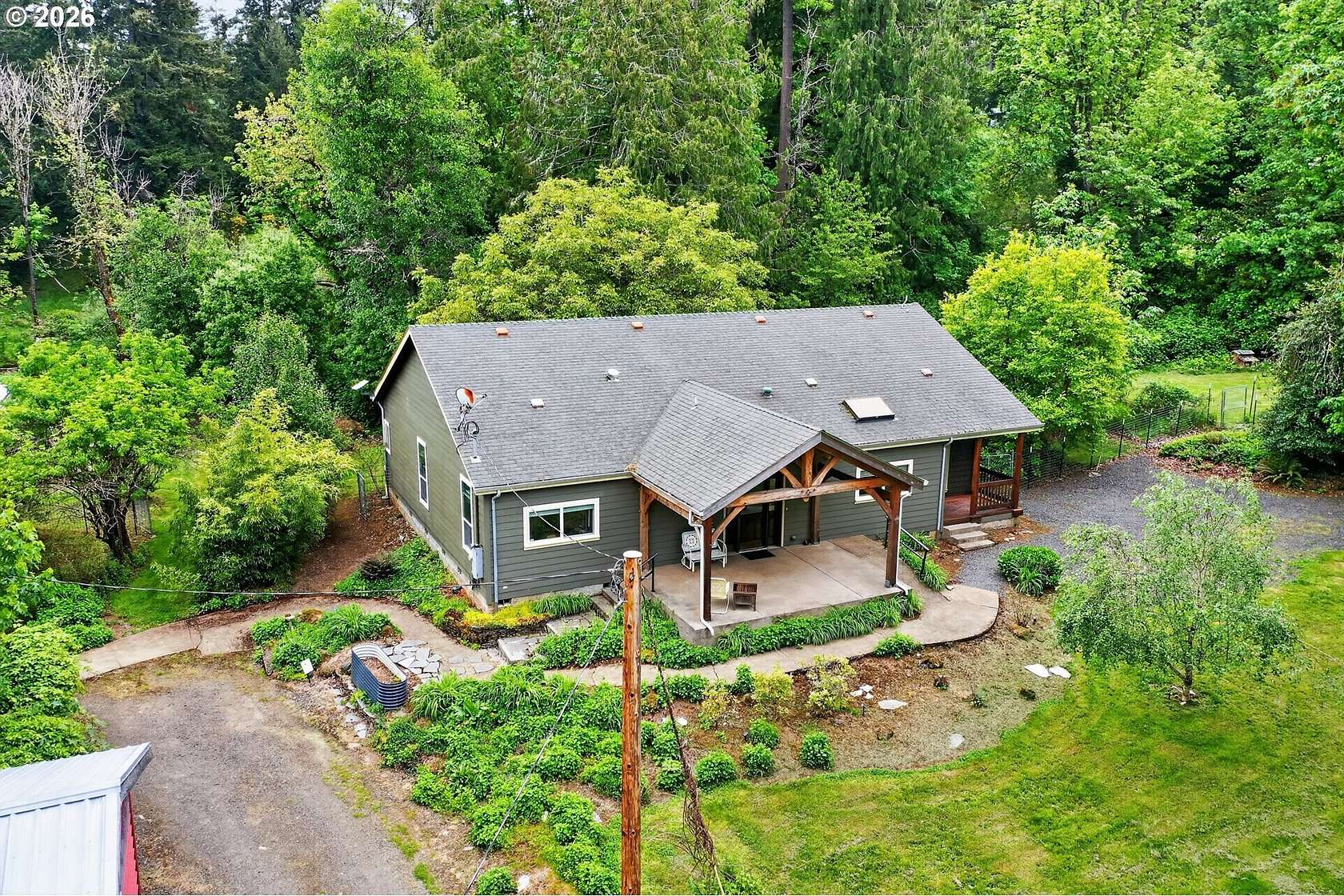 6.32 Acres of Land with Home for Sale in Scotts Mills, Oregon