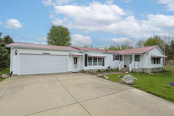 5 Acres of Land with Home for Sale in Birch Run, Michigan