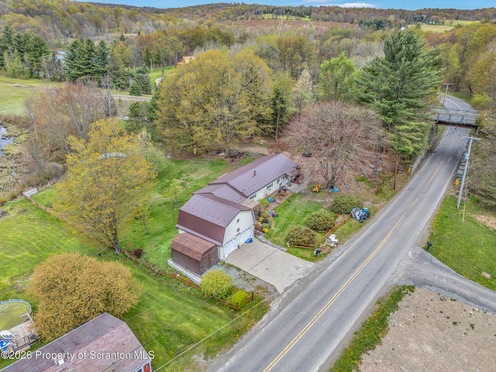 10.6 Acres of Land with Home for Sale in Thompson, Pennsylvania