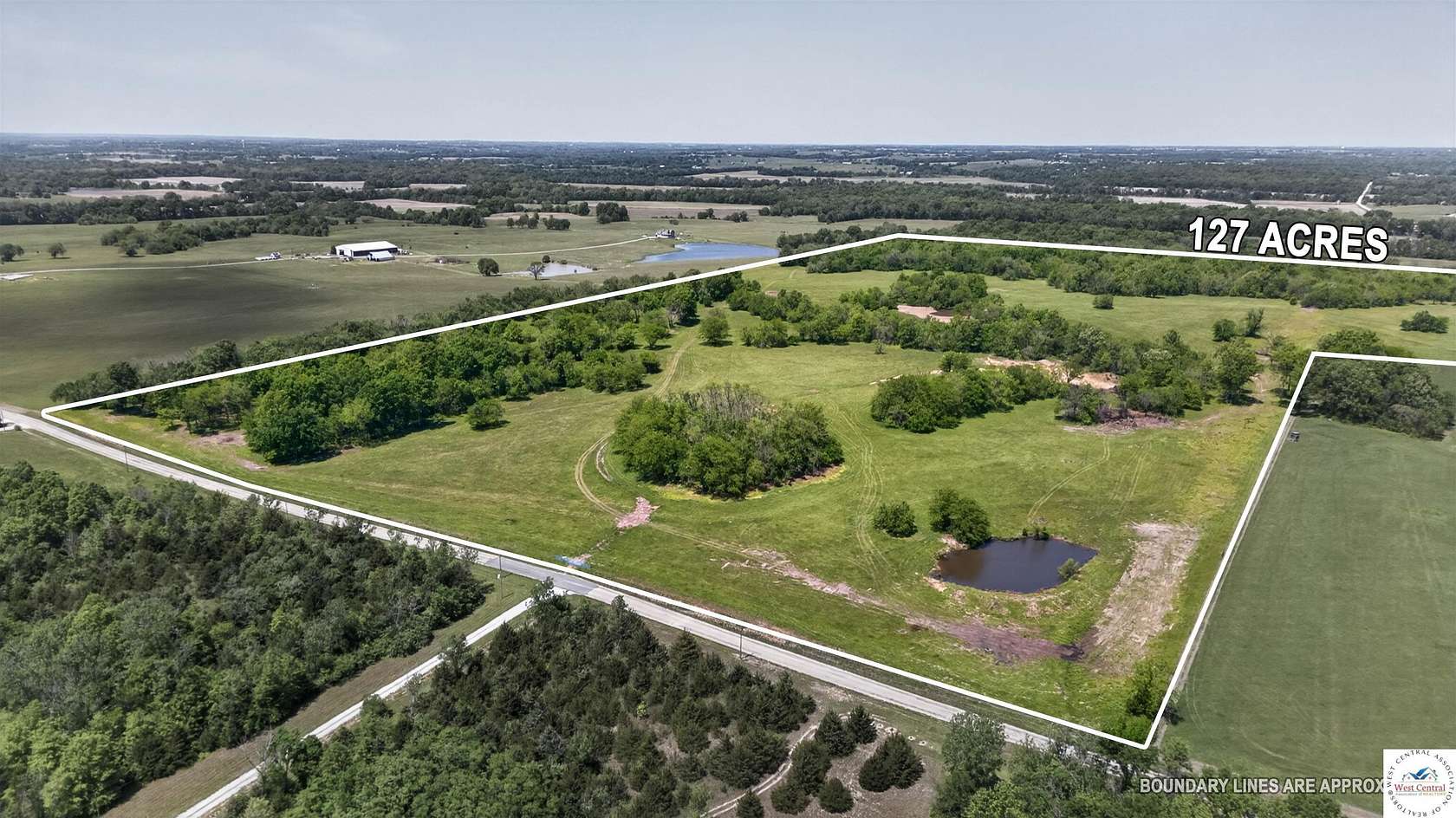 127 Acres of Recreational & Residential Land for Sale in Warrensburg, Missouri