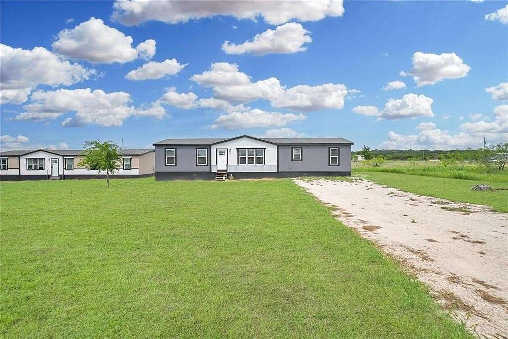 3.87 Acres of Land with Home for Sale in Cleburne, Texas