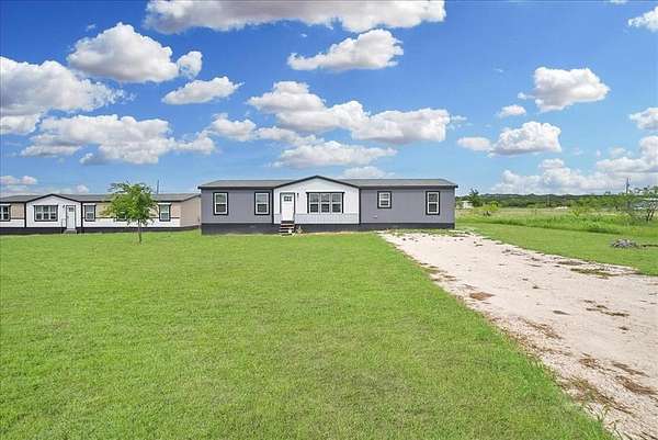 3.87 Acres of Land with Home for Sale in Cleburne, Texas