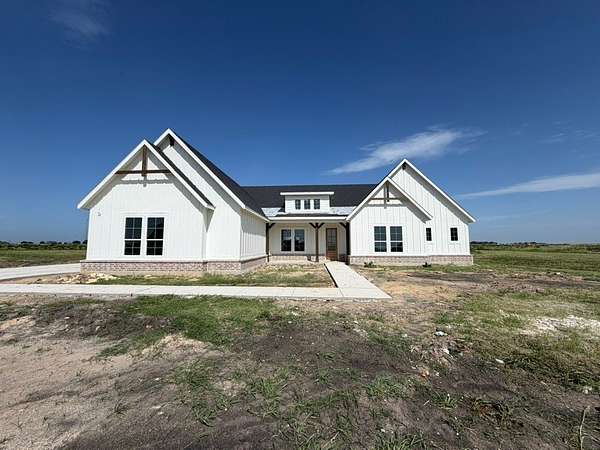 1.5 Acres of Land with Home for Sale in Krum, Texas