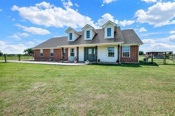 5 Acres of Land with Home for Sale in Rhome, Texas