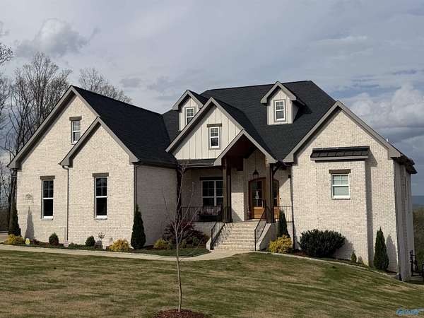 6.79 Acres of Land with Home for Sale in Owens Cross Roads, Alabama