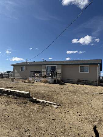 5 Acres of Land with Home for Sale in Glenrock, Wyoming