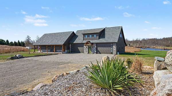 31.7 Acres of Land with Home for Sale in Grass Lake, Michigan