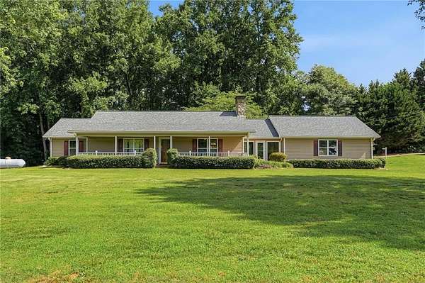 1.57 Acres of Land with Home for Sale in Cumming, Georgia