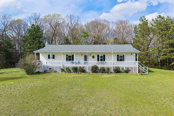 3 Acres of Land with Home for Sale in Scotts Hill, Tennessee