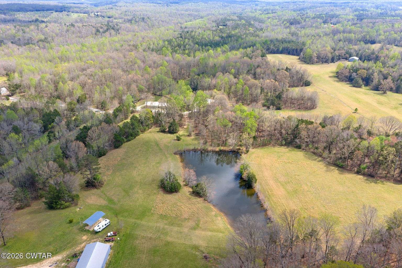62 Acres of Land for Sale in Scotts Hill, Tennessee