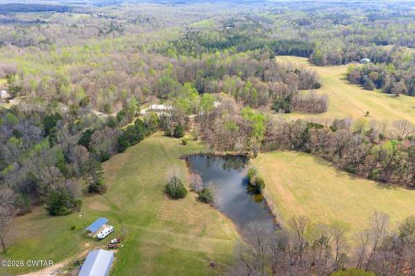 62 Acres of Land for Sale in Scotts Hill, Tennessee