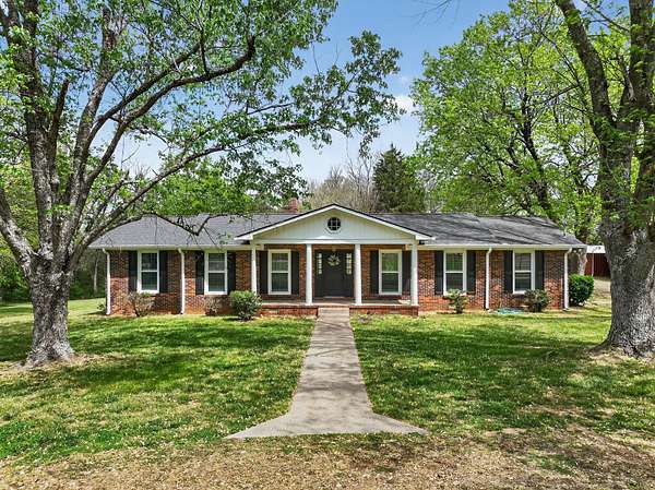 6.15 Acres of Land with Home for Auction in Milton, Tennessee