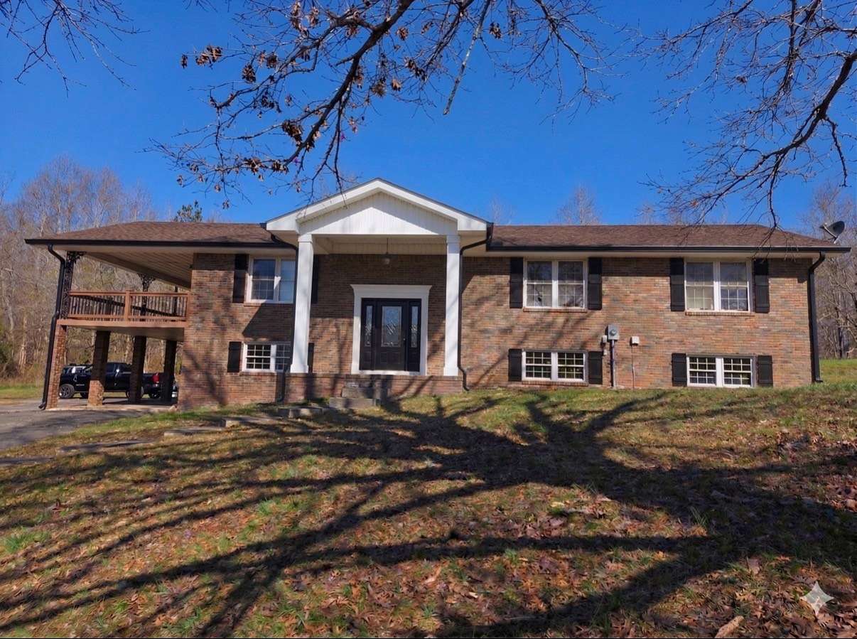 15.4 Acres of Land with Home for Sale in Hohenwald, Tennessee