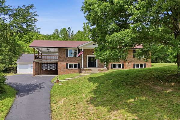 15.4 Acres of Land with Home for Sale in Hohenwald, Tennessee