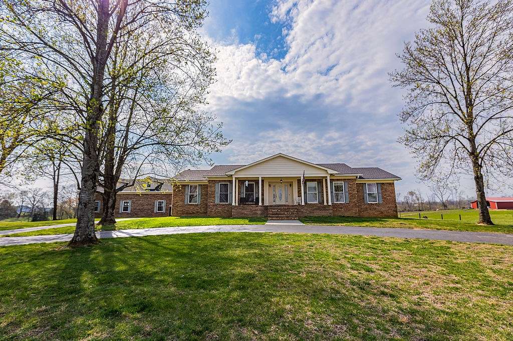 21.4 Acres of Land with Home for Auction in McMinnville, Tennessee