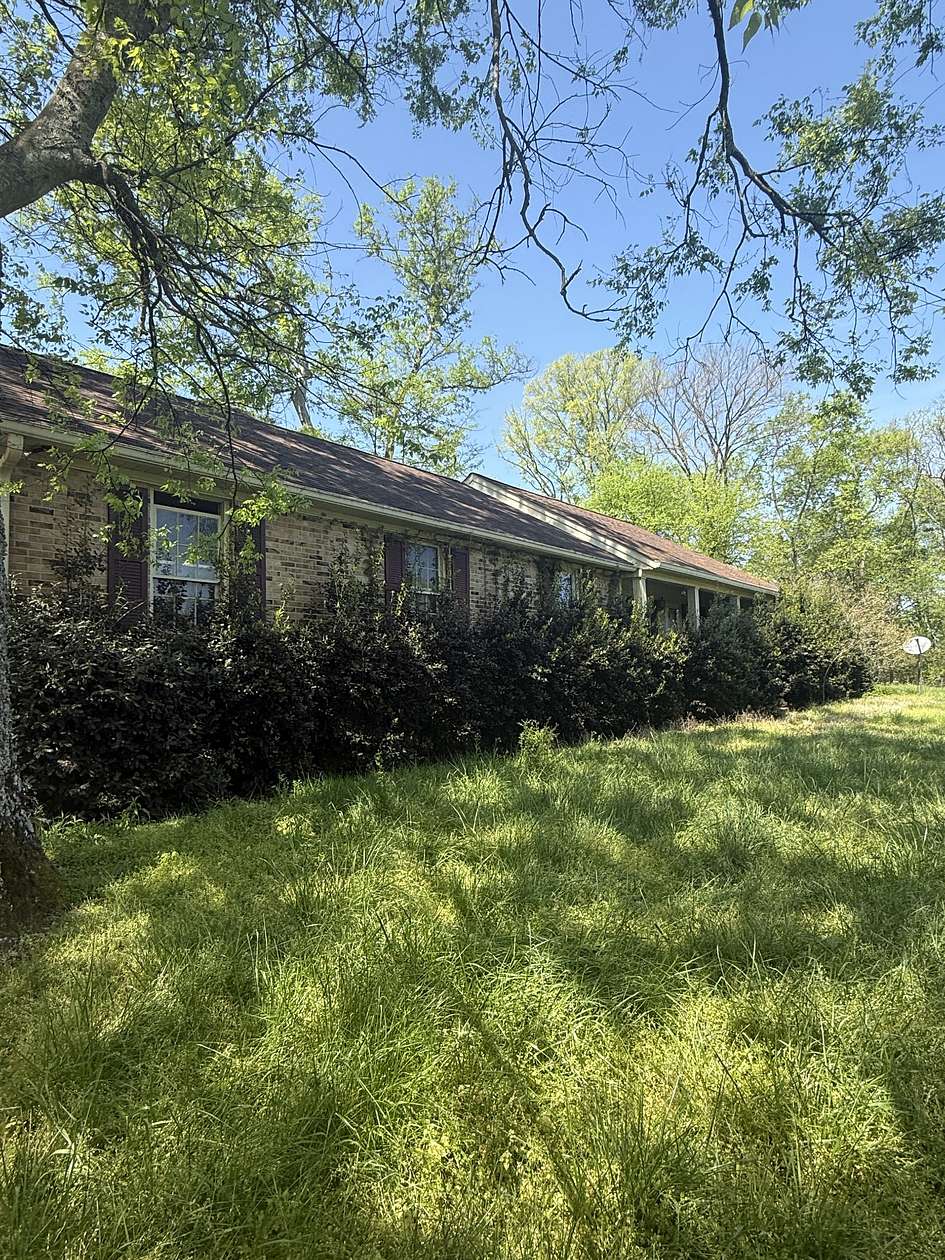 19.1 Acres of Land with Home for Auction in Columbia, Tennessee