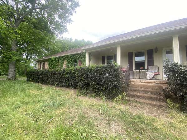 19.1 Acres of Land with Home for Auction in Columbia, Tennessee