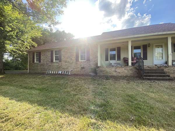 19.1 Acres of Land with Home for Auction in Columbia, Tennessee