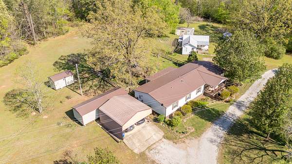 6 Acres of Land with Home for Sale in Clifton, Tennessee