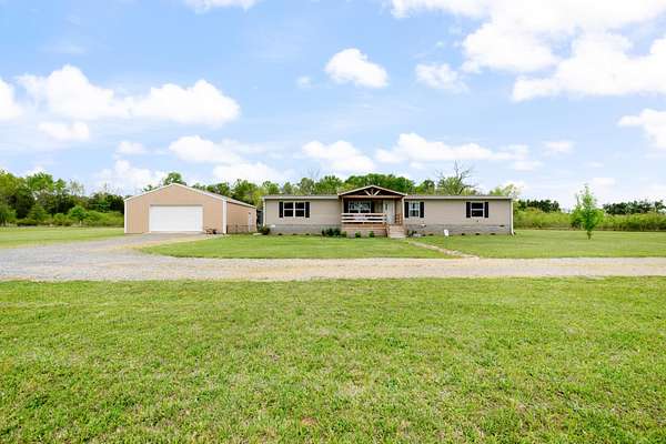 1.53 Acres of Land with Home for Sale in Christiana, Tennessee