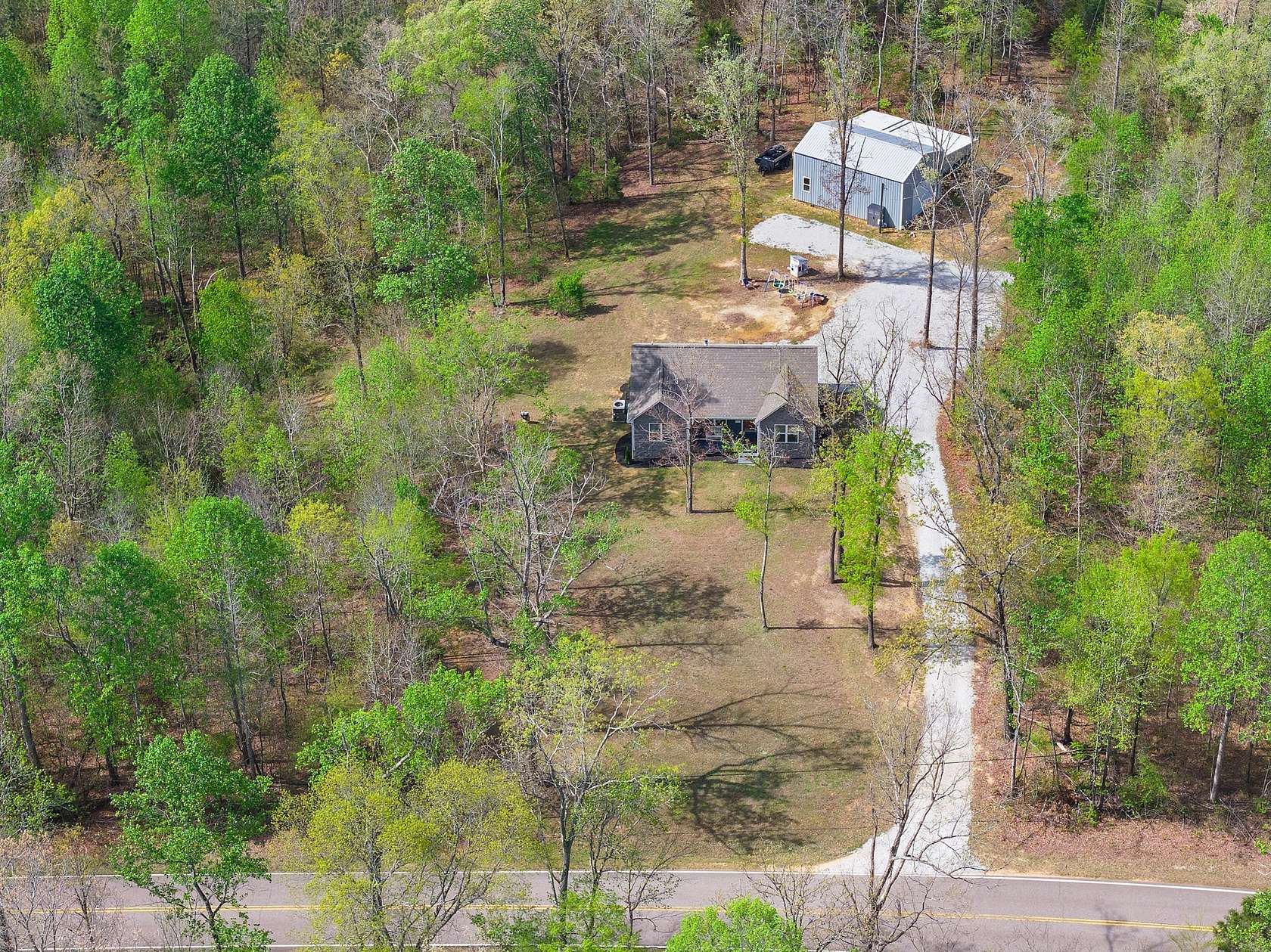 13.3 Acres of Recreational Land with Home for Sale in Parsons, Tennessee