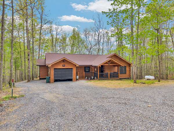 5 Acres of Land with Home for Sale in Moss, Tennessee