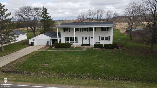 33.3 Acres of Land with Home for Sale in Owosso, Michigan