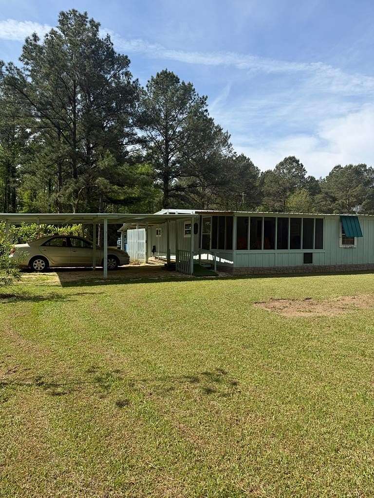 5 Acres of Land with Home for Sale in Brewton, Alabama