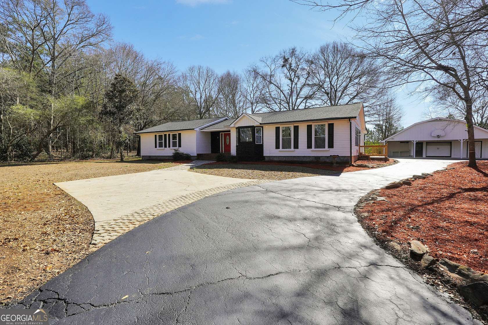 1.5 Acres of Land with Home for Sale in McDonough, Georgia