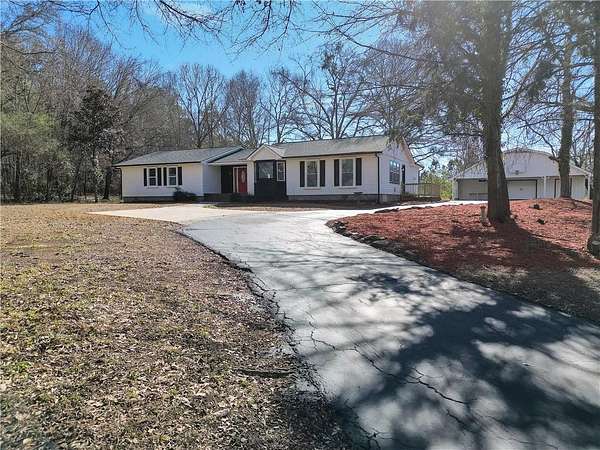 1.5 Acres of Land with Home for Sale in McDonough, Georgia