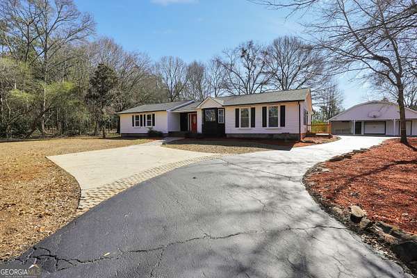 1.5 Acres of Land with Home for Sale in McDonough, Georgia