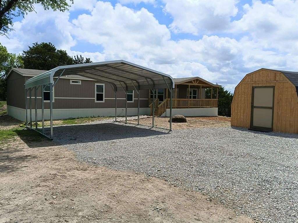 2.3 Acres of Land with Home for Sale in Springtown, Texas