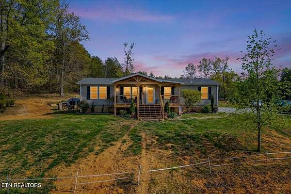 9.22 Acres of Land with Home for Sale in Madisonville, Tennessee