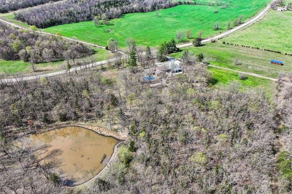 20 Acres of Recreational Land with Home for Sale in Cross Timbers, Missouri