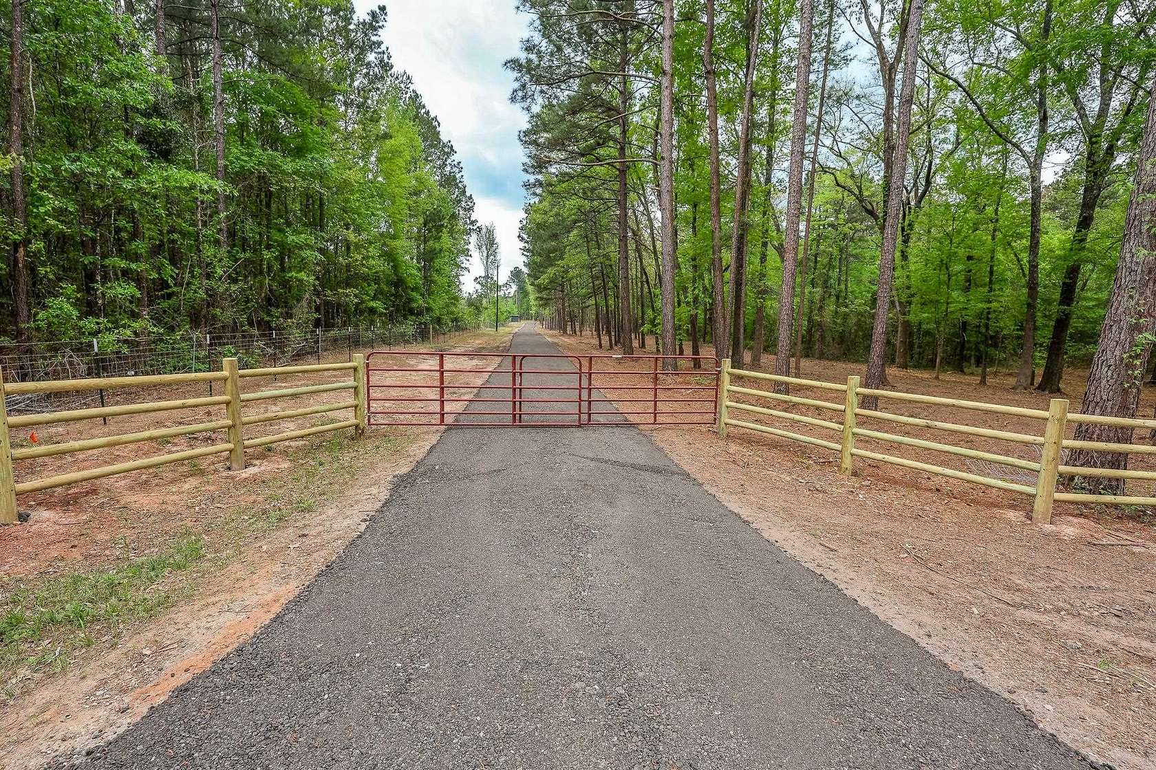 50.3 Acres of Recreational Land with Home for Sale in Ore City, Texas