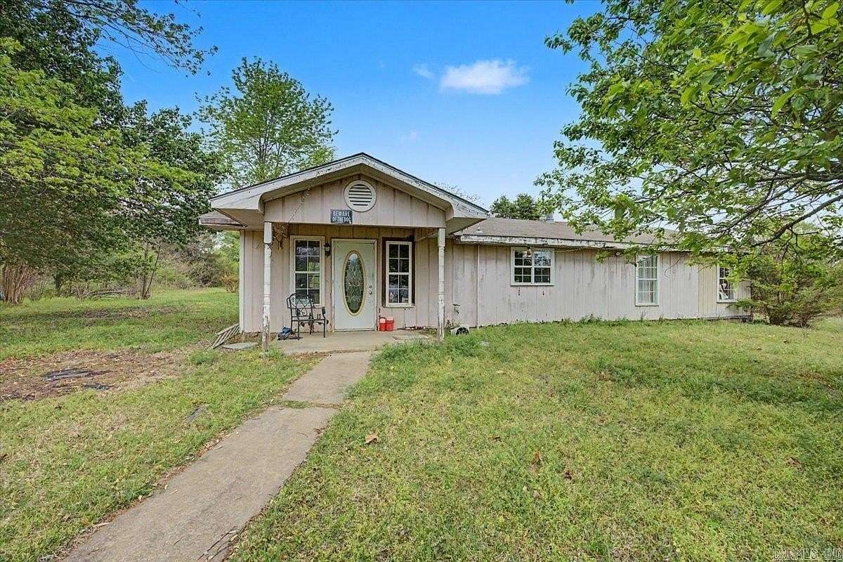 1.75 Acres of Land with Home for Sale in Romance, Arkansas