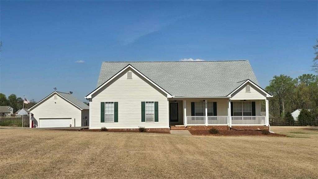 1.5 Acres of Land with Home for Sale in Hoschton, Georgia