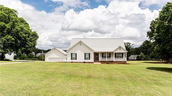 1.5 Acres of Land with Home for Sale in Hoschton, Georgia