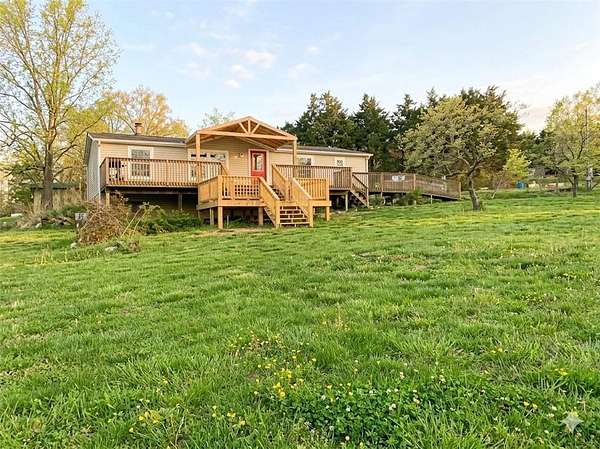 5 Acres of Land with Home for Sale in Wheatland, Missouri