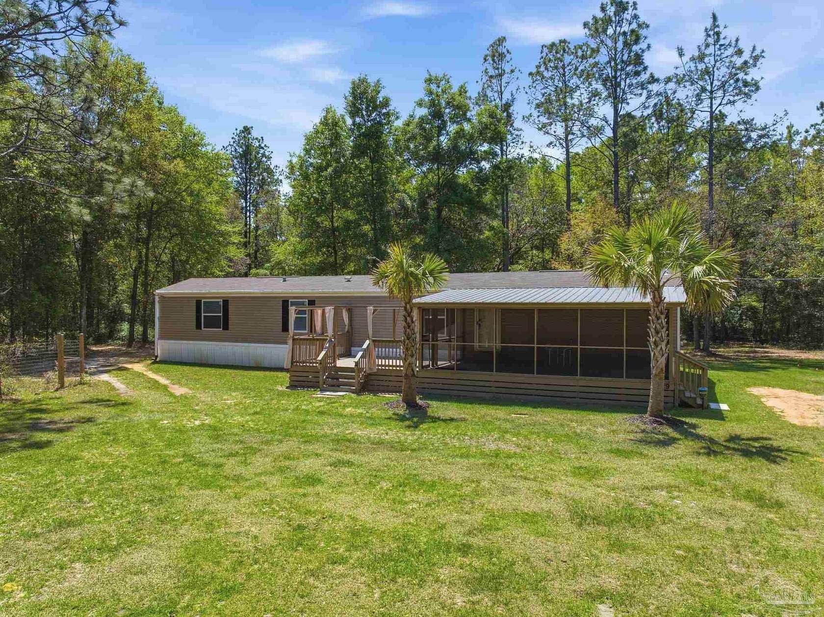 1.6 Acres of Land with Home for Sale in Milton, Florida