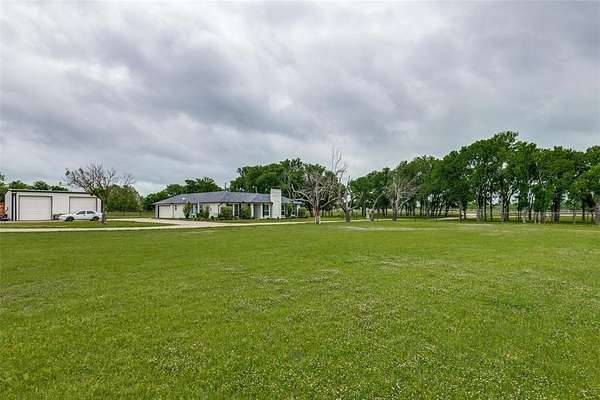 7.82 Acres of Land with Home for Sale in Terrell, Texas